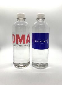 Two clear, plastic water bottles with custom labels